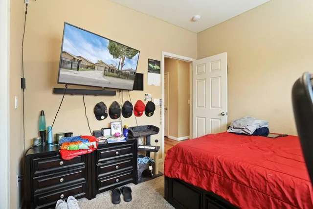 a bedroom with a bed and a closet