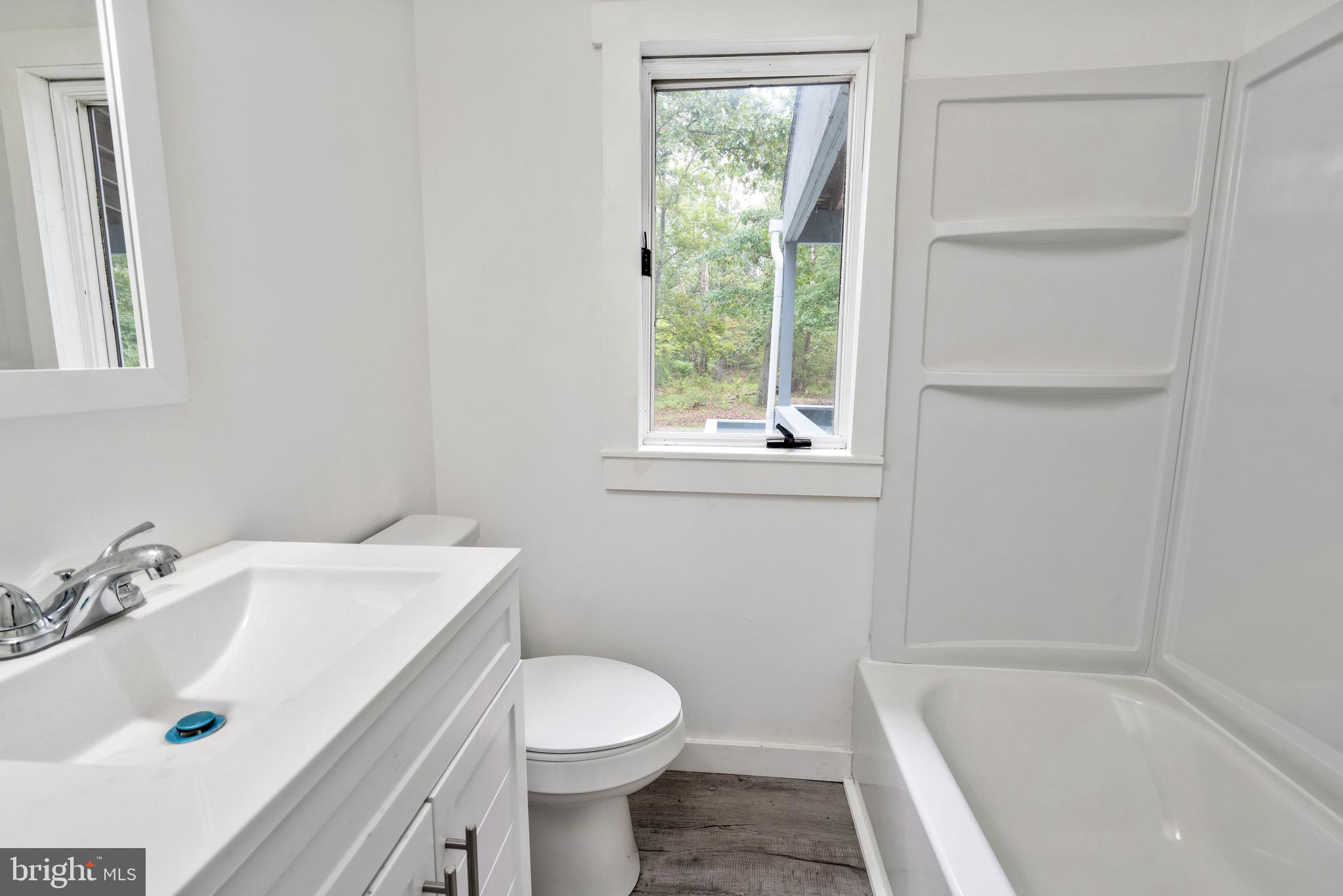 485 Lummistown Road Cedarville, NJ 08311 - Photo 17 of 34 a bathroom with a sink a toilet and shower