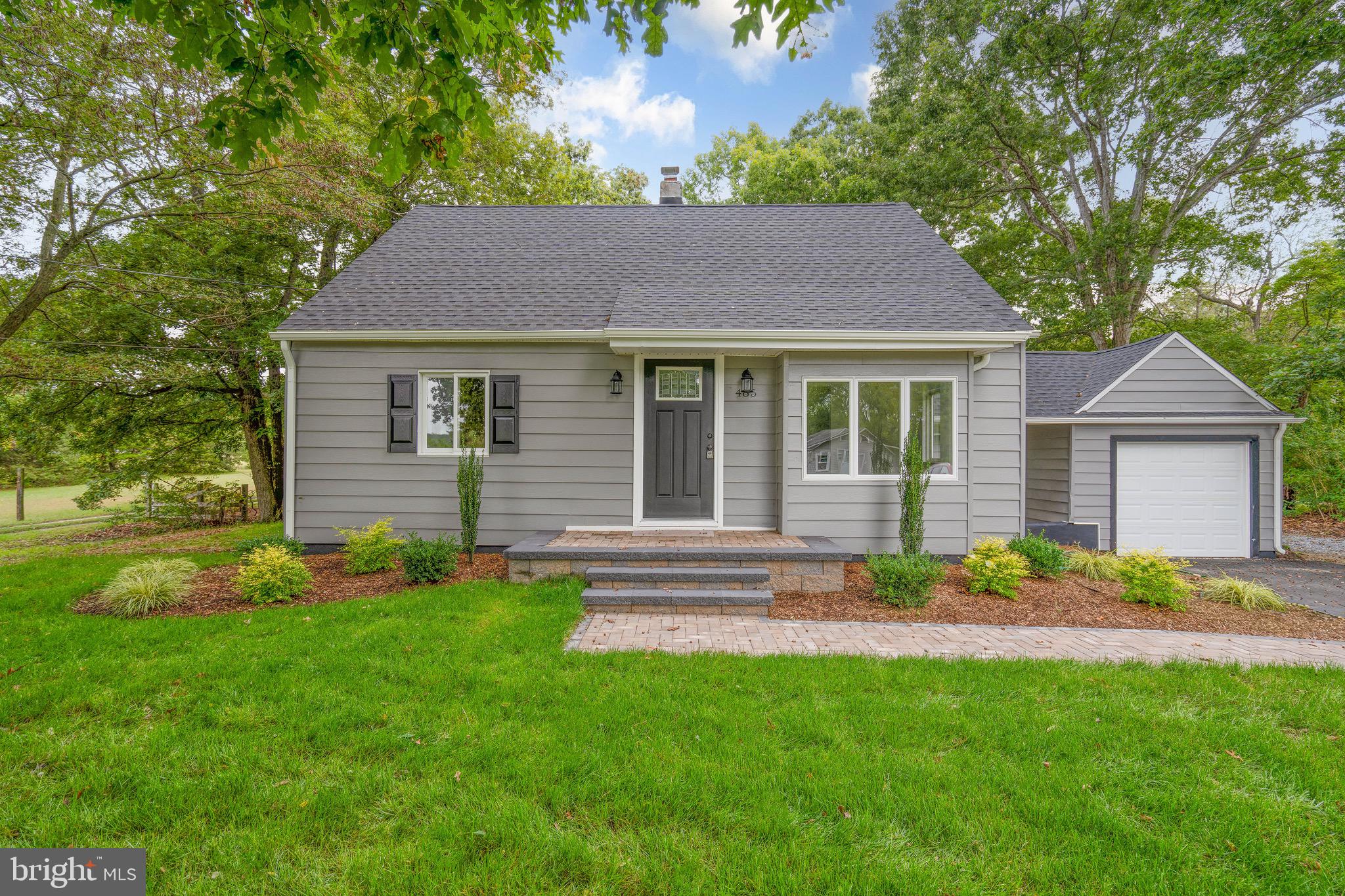 485 Lummistown Road Cedarville, NJ 08311 - Photo 2 of 34 a front view of a house with a garden