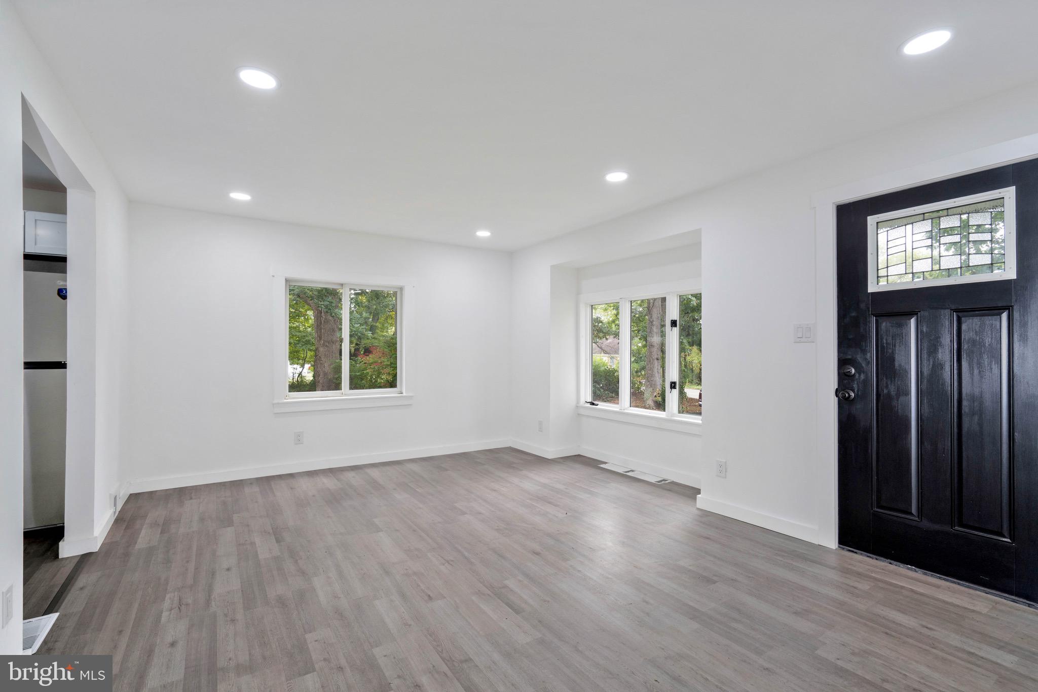 485 Lummistown Road Cedarville, NJ 08311 - Photo 9 of 34 an empty room with wooden floor and windows