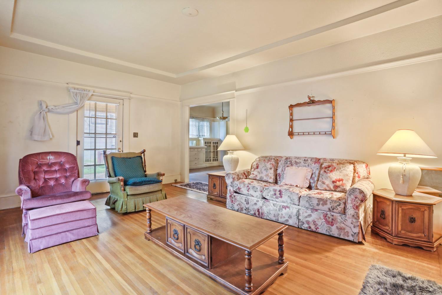 1428 West Harding Way Stockton, CA 95203 - Photo 11 of 32 a living room with furniture and wooden floor