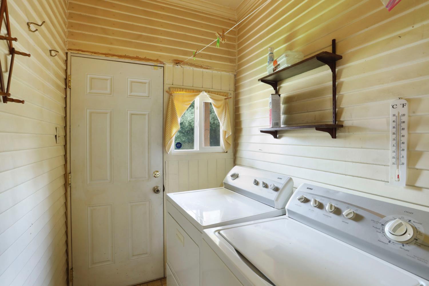 1428 West Harding Way Stockton, CA 95203 - Photo 26 of 32 a utility room with dryer and washer