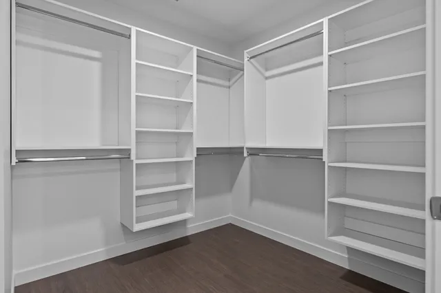 a view of an empty walk in closet