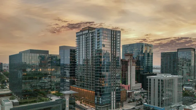 a view of a city with tall buildings