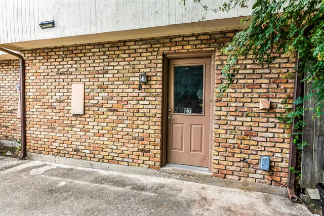 a front view of a house with a door