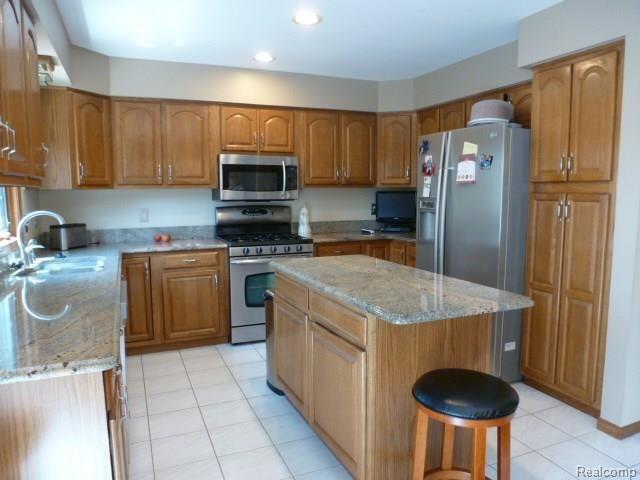 2727 Bowen Road Howell, MI 48843 - Photo 13 of 34 Island Kitchen You Dreamed of With Granite Counters and Lots of Cabinets