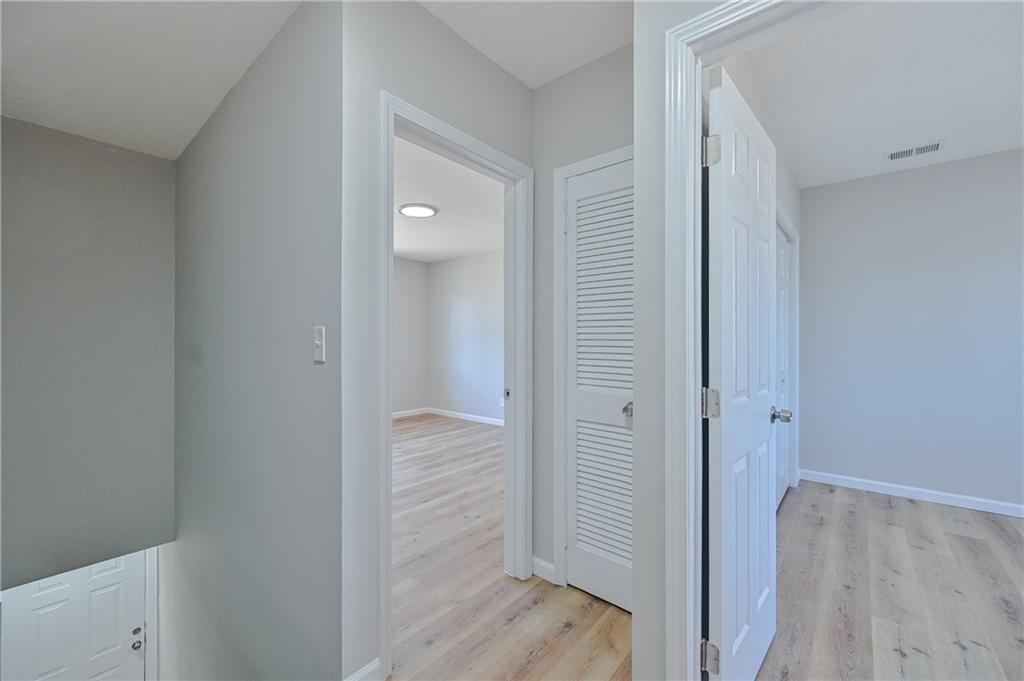 955 Tilden Street Northwest Atlanta, GA 30318 - Photo 16 of 25 a view of a bathroom with wooden floor