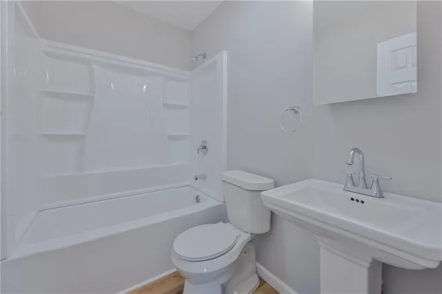 a bathroom with a sink and a toilet