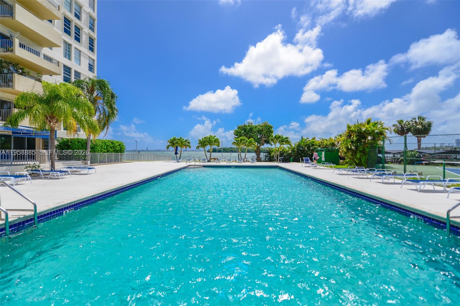 880 Northeast 69th Street, Unit 2N Miami, FL 33138 - Photo 15 of 23 a swimming pool with barbeque oven