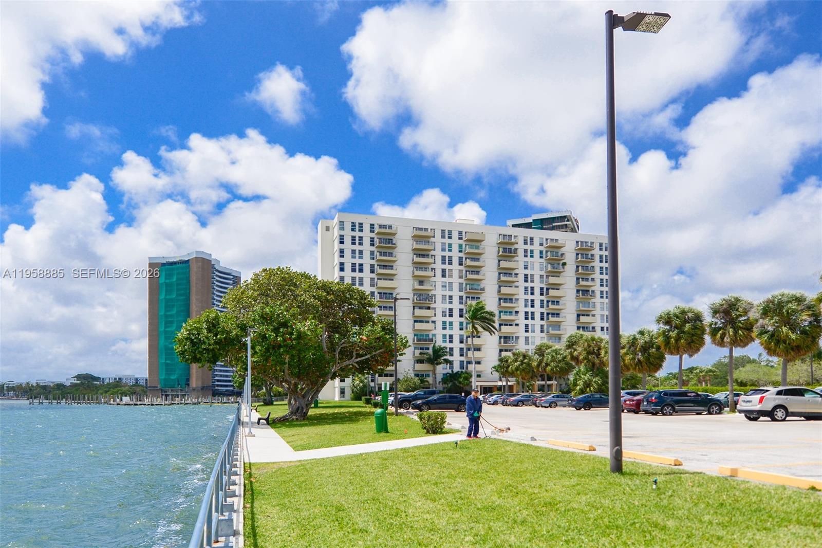 880 Northeast 69th Street, Unit 2N Miami, FL 33138 - Photo 2 of 23 a view of a city with tall buildings