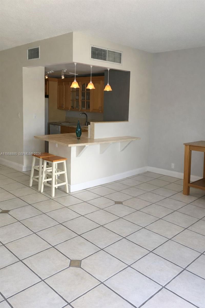 880 Northeast 69th Street, Unit 2N Miami, FL 33138 - Photo 21 of 23 a view of living room with furniture
