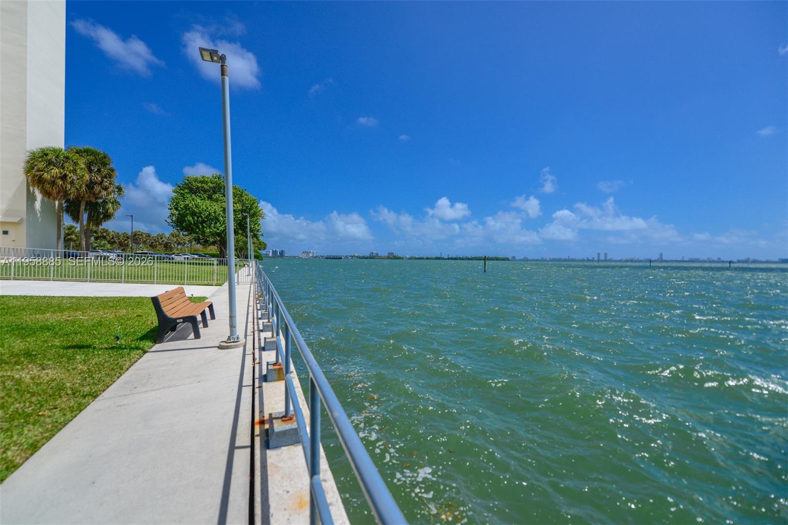 880 Northeast 69th Street, Unit 2N Miami, FL 33138 - Photo 9 of 23 a view of a garden with a slide