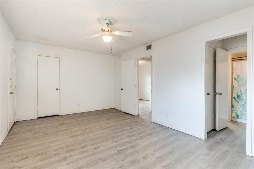 1913 San Rafael Street Fort Worth, TX 76134 - Photo 9 of 12 a view of an empty room with wooden floor