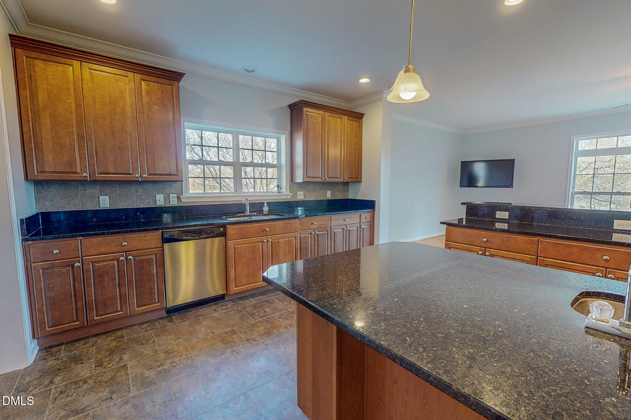 471 Parham Road Roxboro, NC 27574 - Photo 11 of 92 a kitchen with stainless steel appliances granite countertop a sink a stove and a microwave