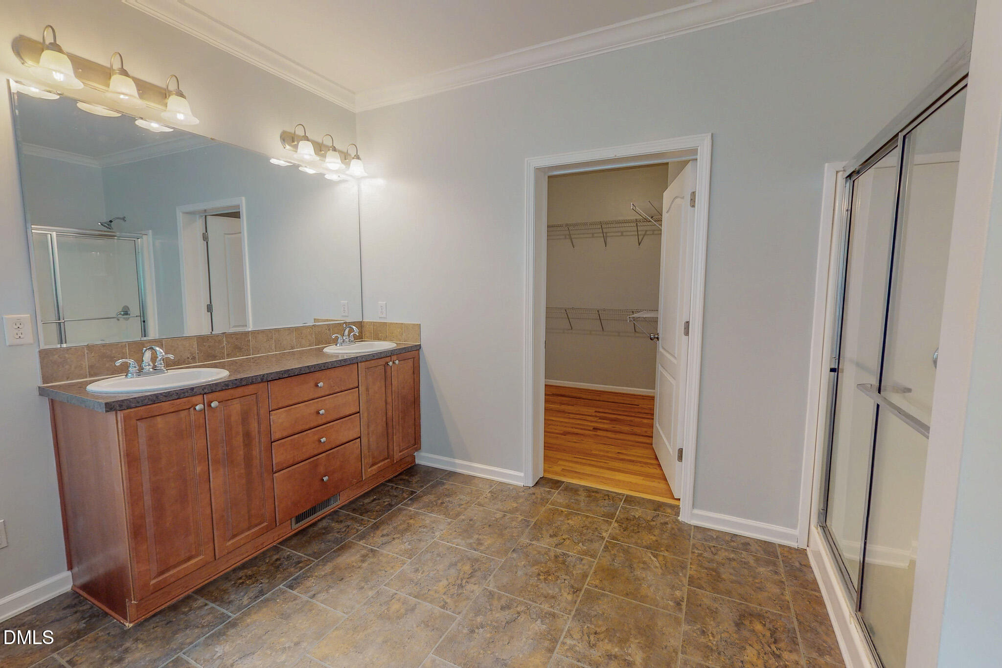 471 Parham Road Roxboro, NC 27574 - Photo 24 of 92 a bathroom with a sink and a mirror