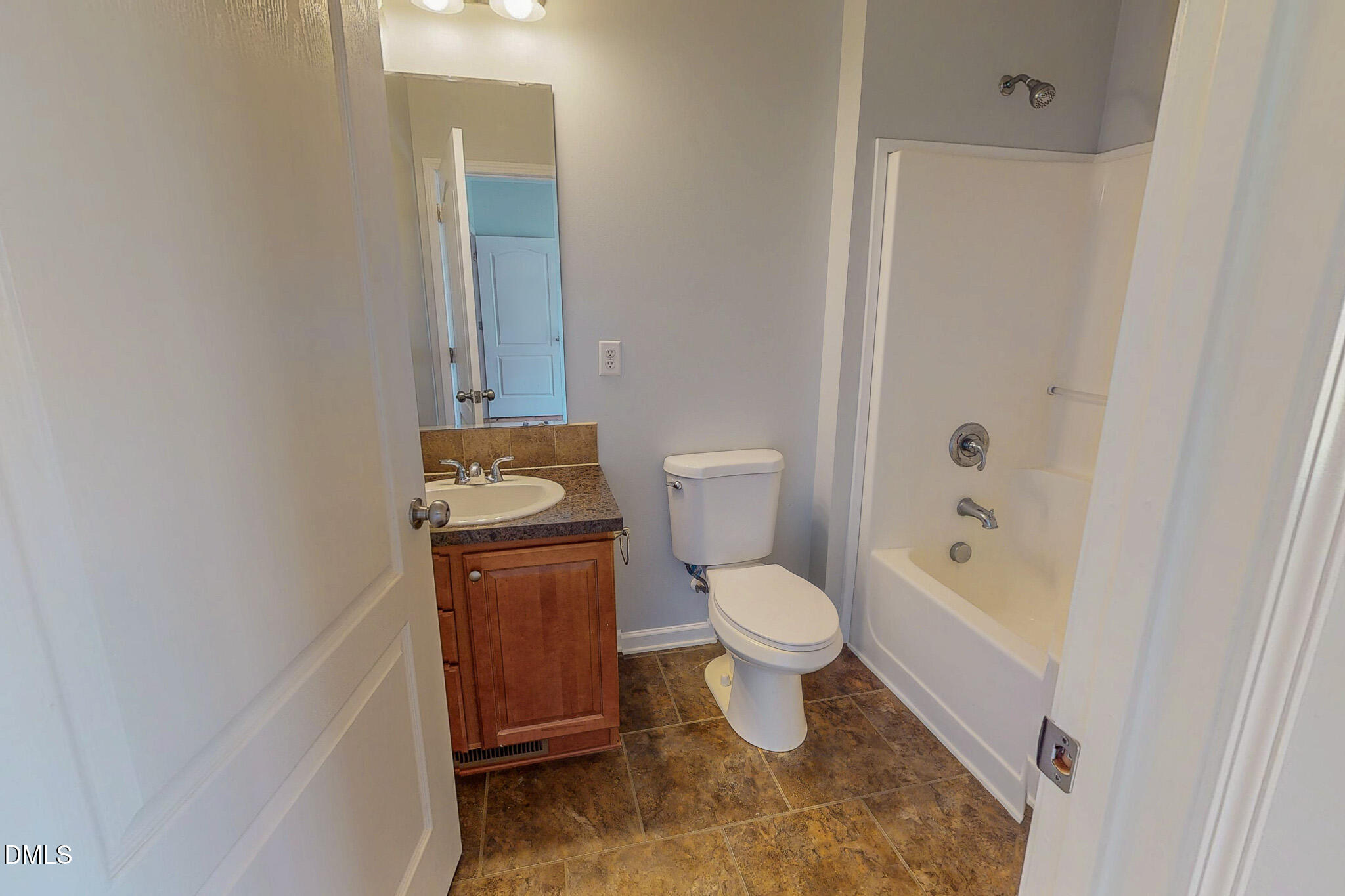 471 Parham Road Roxboro, NC 27574 - Photo 48 of 92 a bathroom with a toilet and a shower