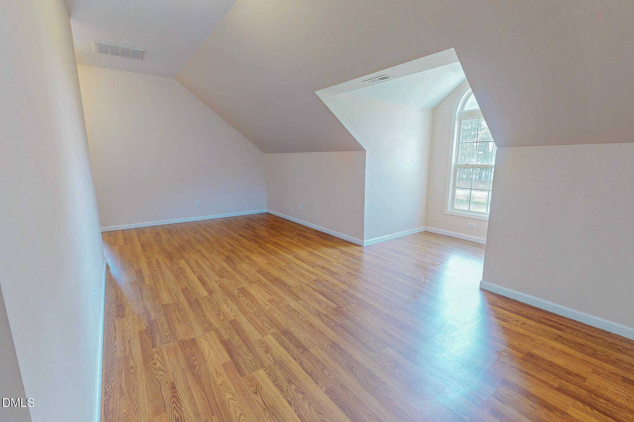 471 Parham Road Roxboro, NC 27574 - Photo 71 of 92 an empty room with wooden floor and windows