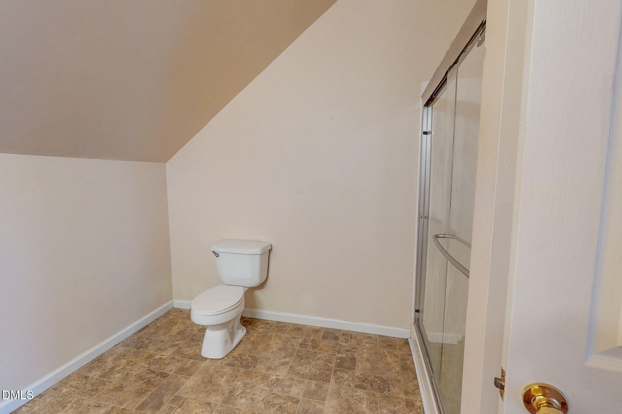 471 Parham Road Roxboro, NC 27574 - Photo 76 of 92 a bathroom with a toilet and a vanity