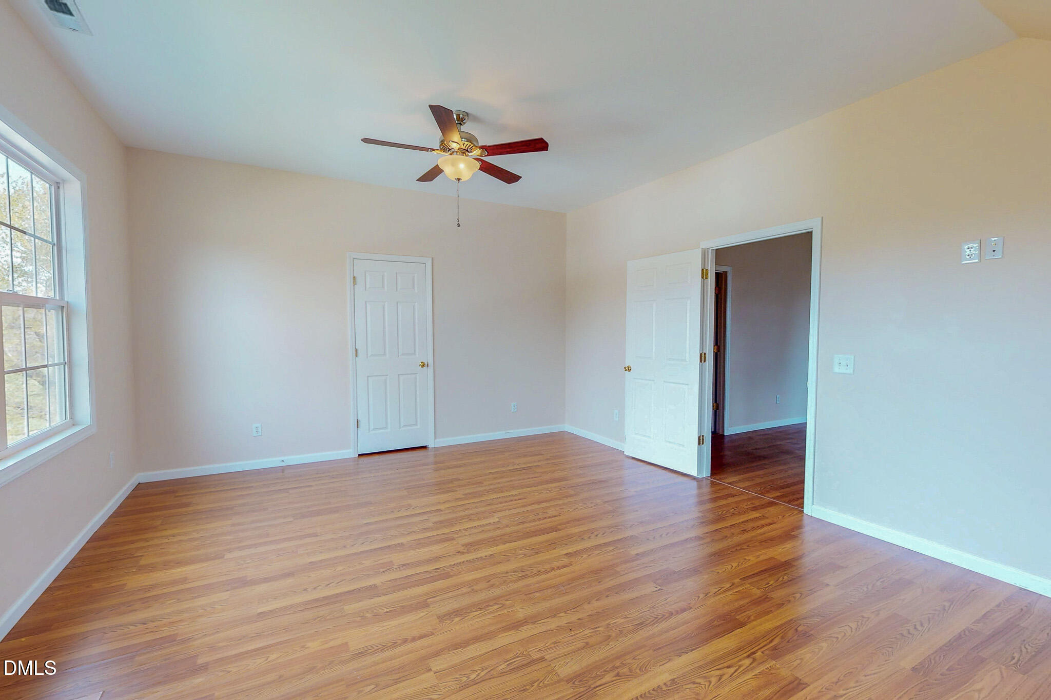471 Parham Road Roxboro, NC 27574 - Photo 80 of 92 a view of empty room with wooden floor and fan