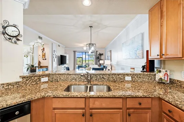 a spacious bedroom with a bed and a flat screen tv