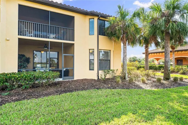 an aerial view of a house with a ocean view