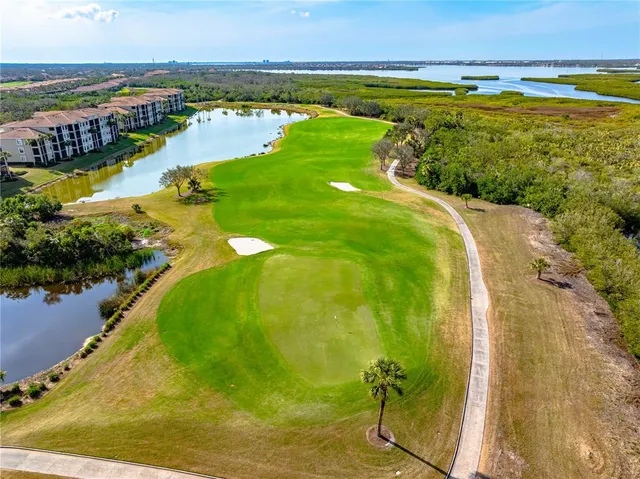 a view of a lake with a city