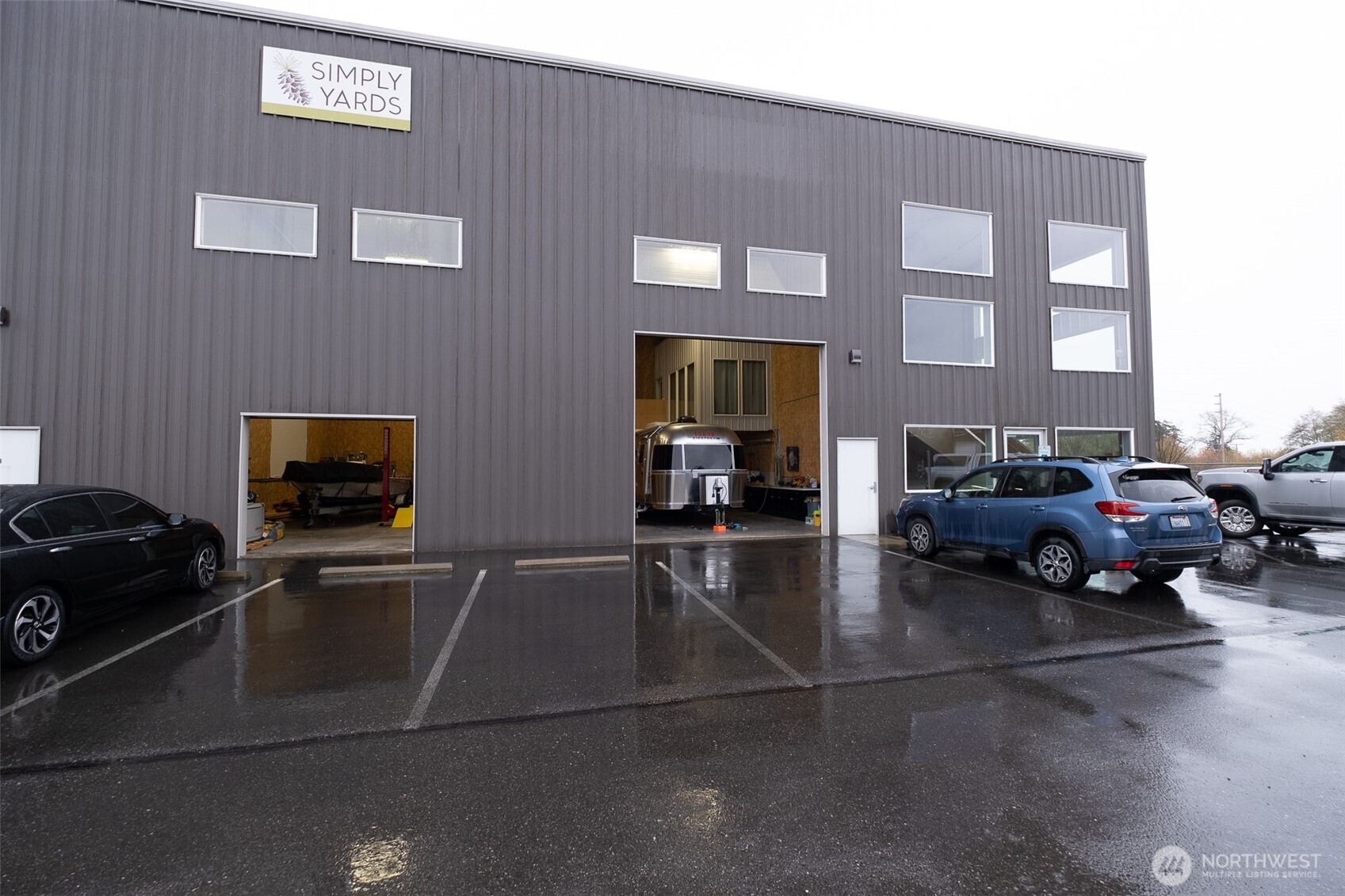 12375 Reservation Road Anacortes, WA 98221 - Photo 11 of 40 a car parked in front of a building