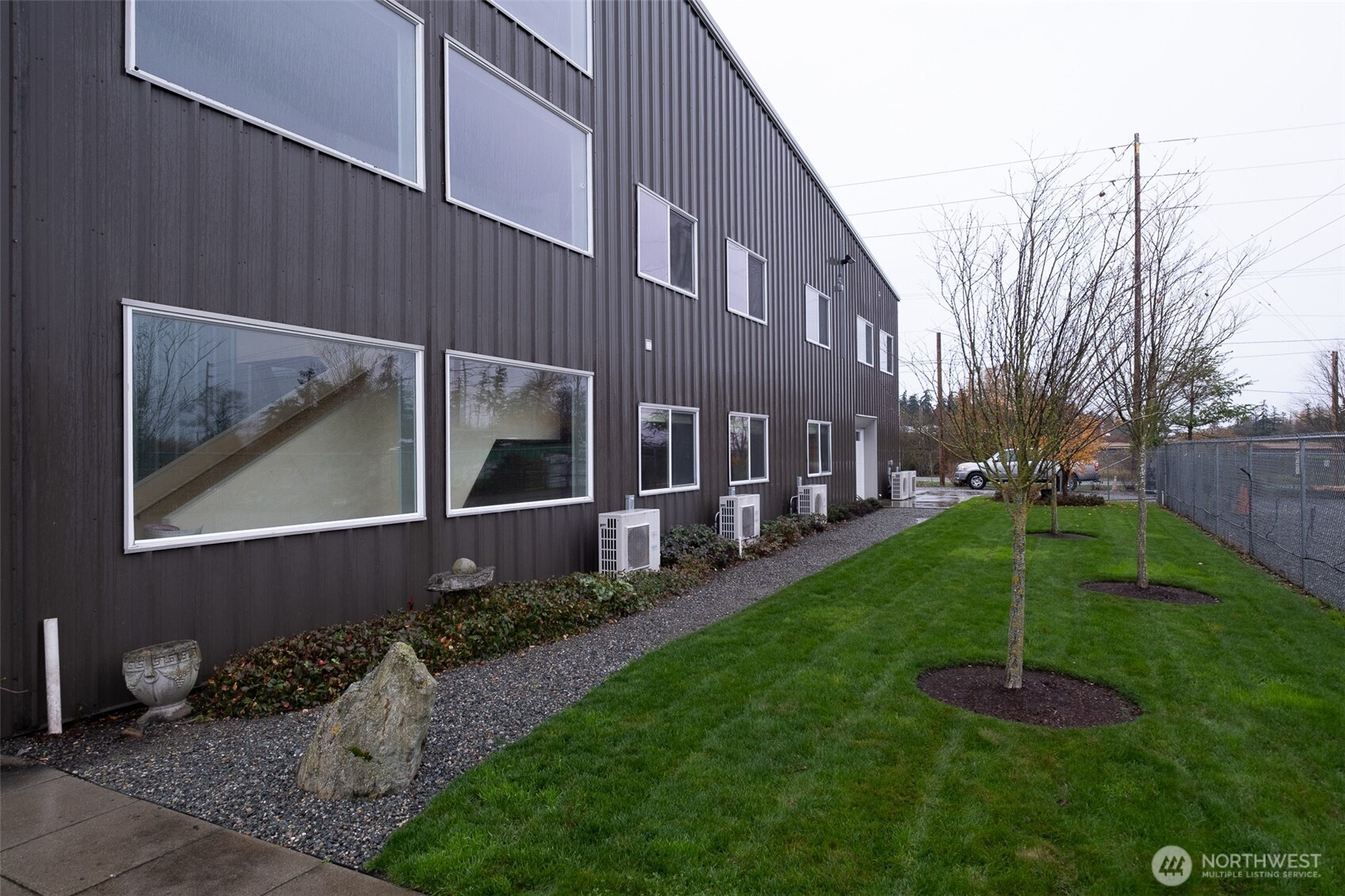 12375 Reservation Road Anacortes, WA 98221 - Photo 8 of 40 a front view of a house with a yard