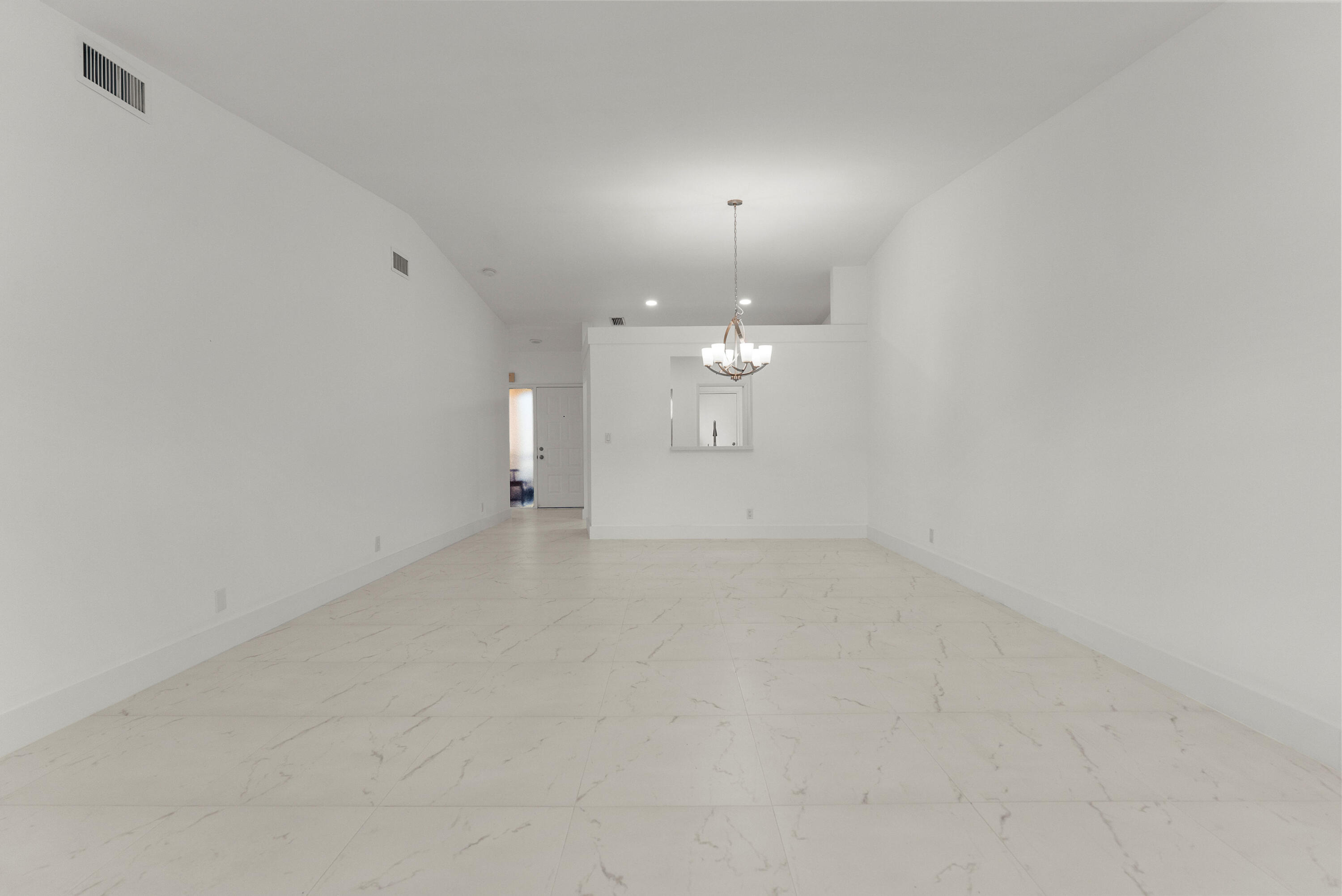 8273 Springtree Road Boca Raton, FL 33496 - Photo 20 of 36 an empty room with an empty space