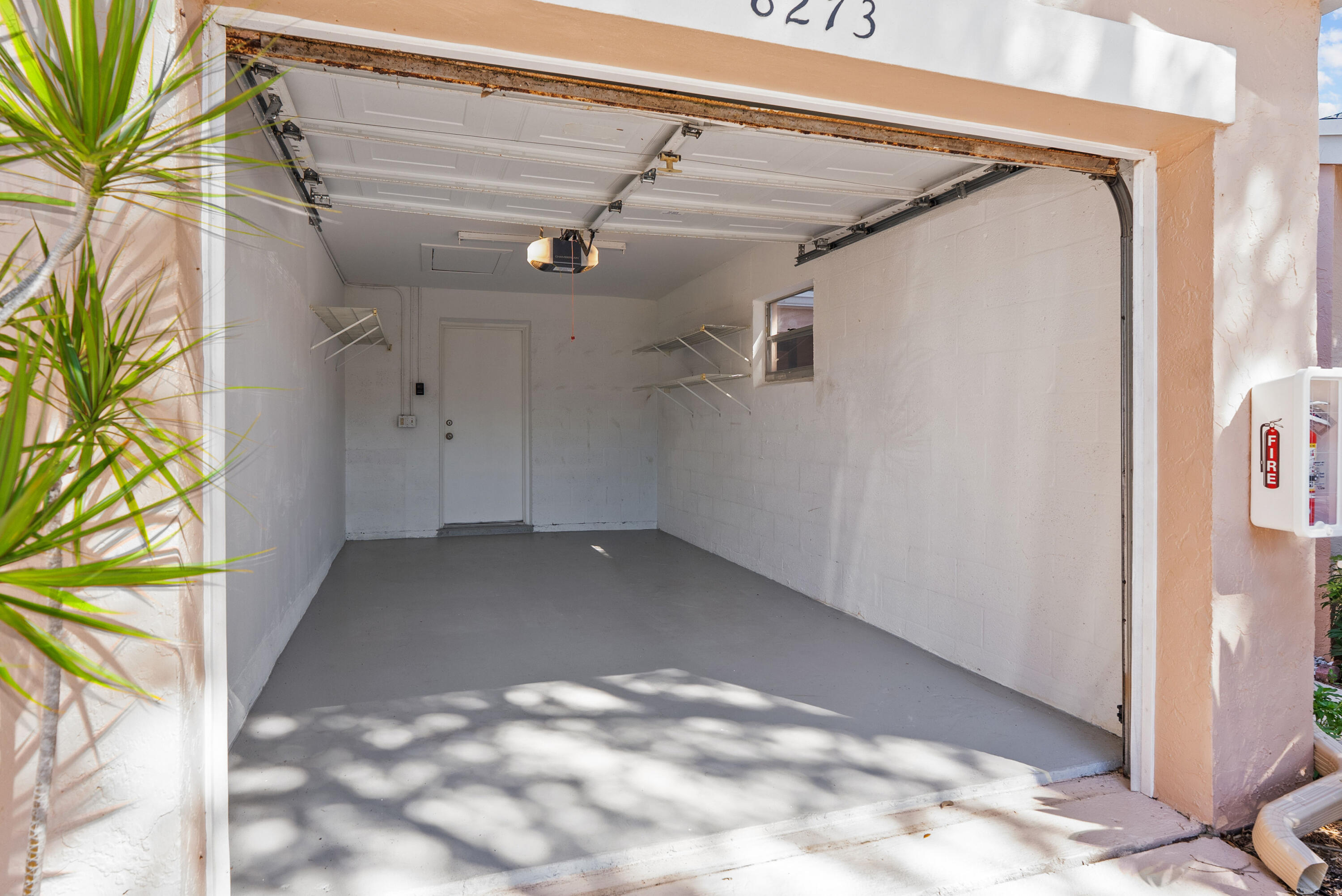 8273 Springtree Road Boca Raton, FL 33496 - Photo 28 of 36 a view of a garage