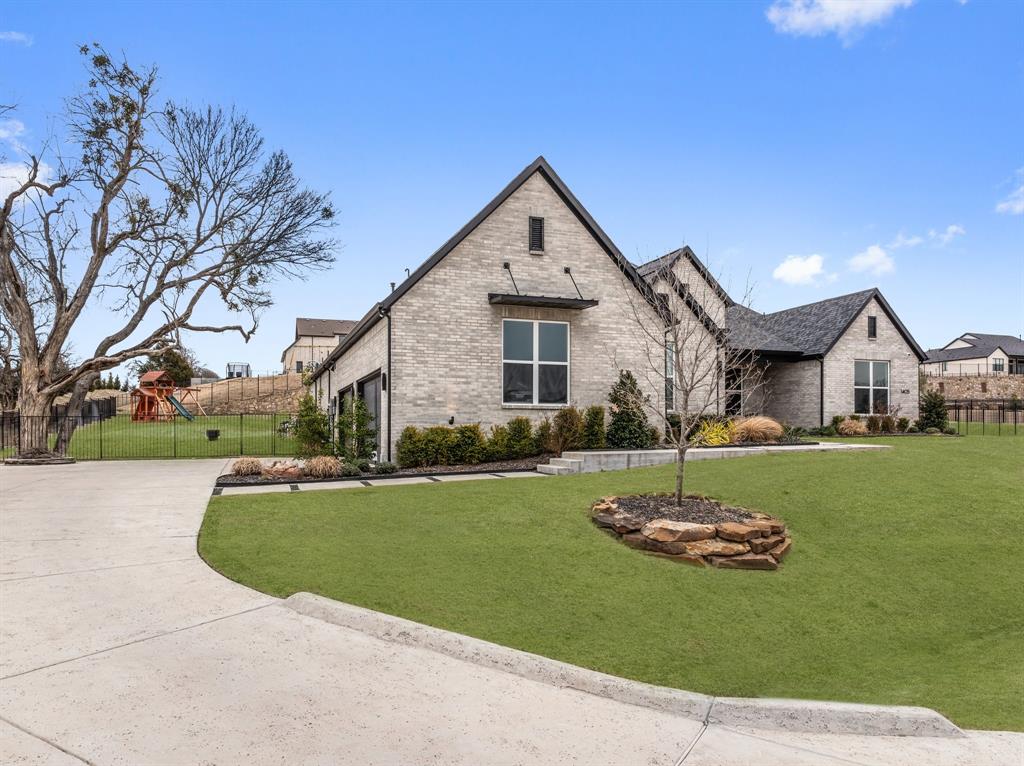 1405 Custer Court Celina, TX 75009 - Photo 2 of 40 a view of a house with a yard