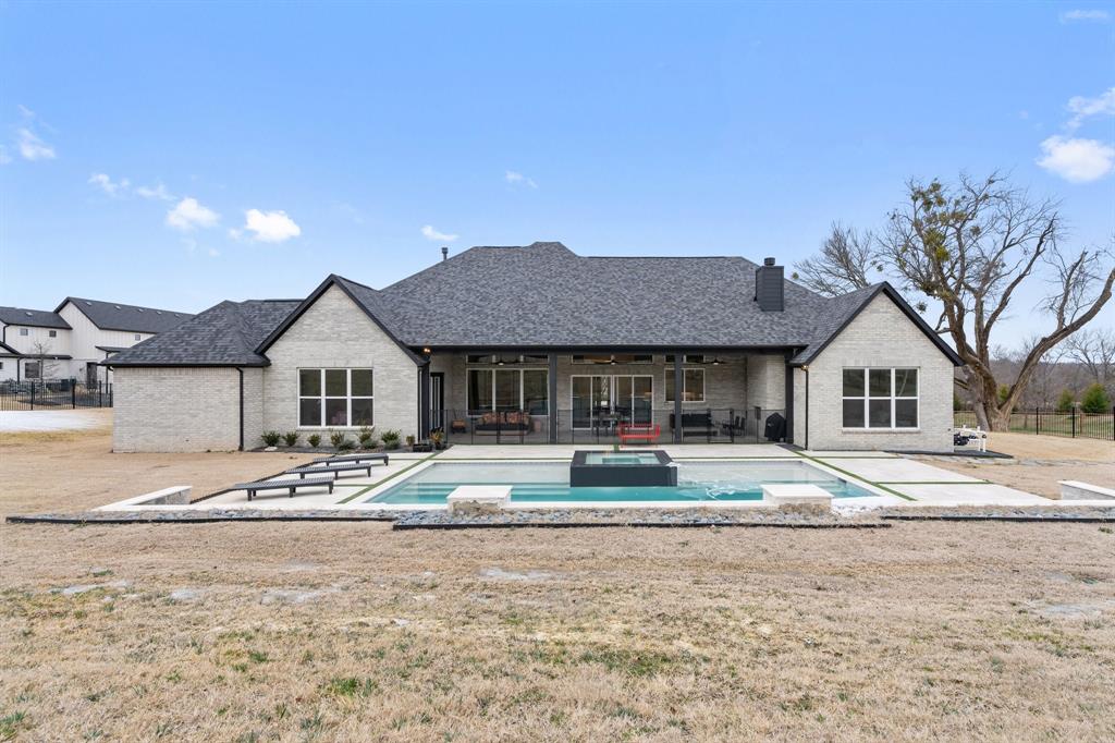 1405 Custer Court Celina, TX 75009 - Photo 36 of 40 a view of a house with a yard and large trees