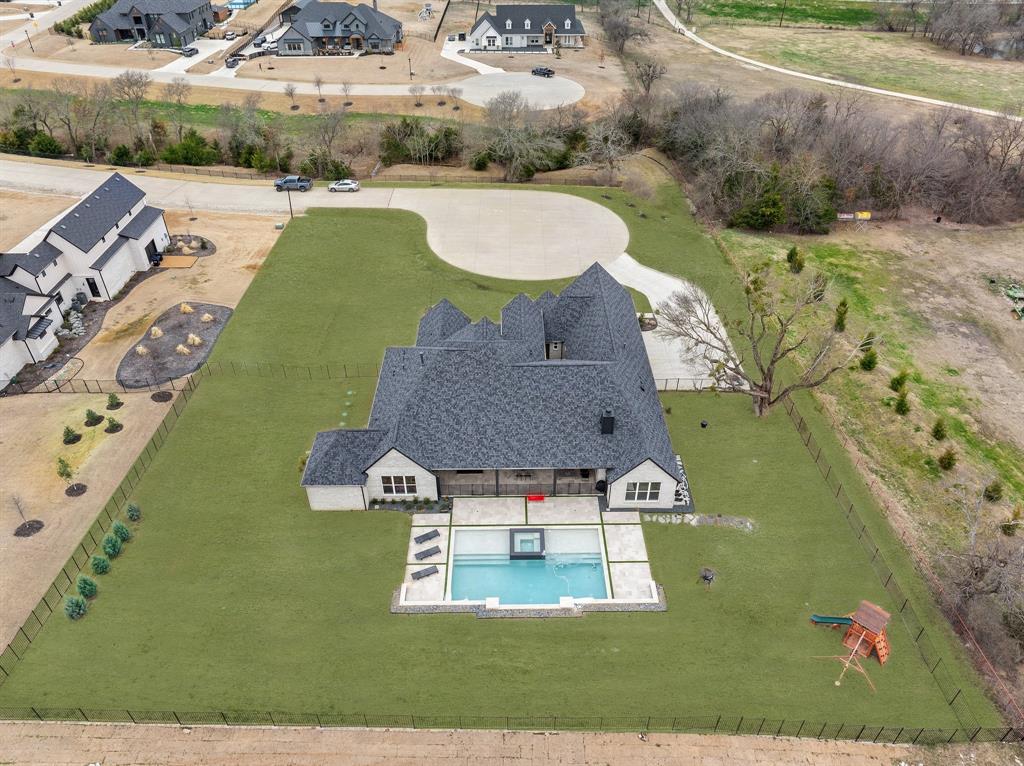1405 Custer Court Celina, TX 75009 - Photo 39 of 40 an aerial view of a house with yard swimming pool and outdoor seating