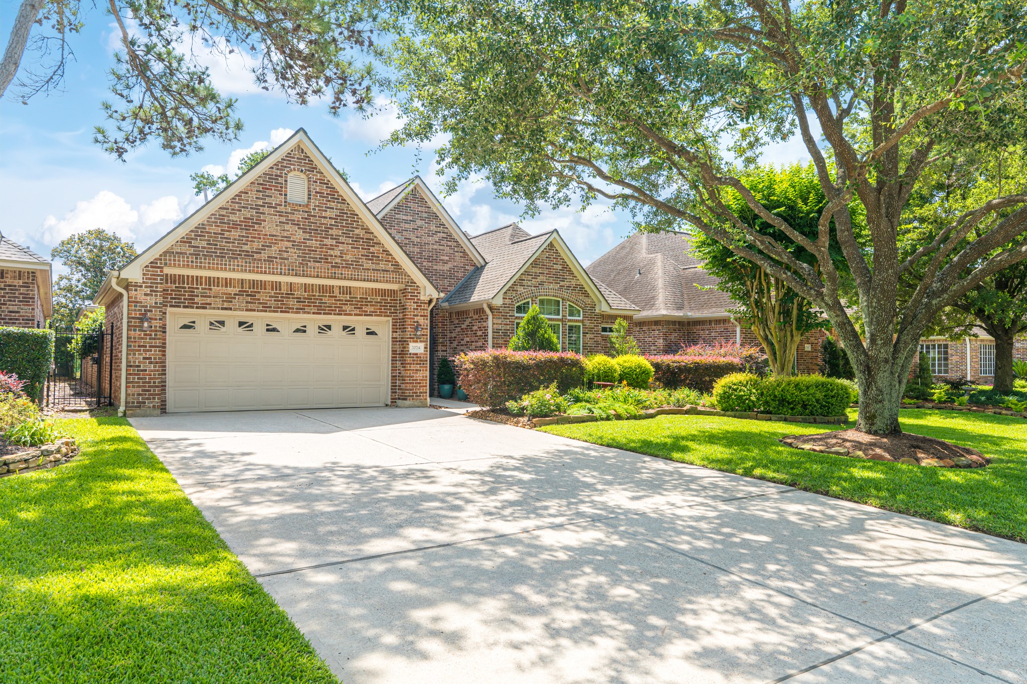 20714 Flora View Court Spring, TX 77379 - Photo 2 of 40 a front view of house with yard and green space