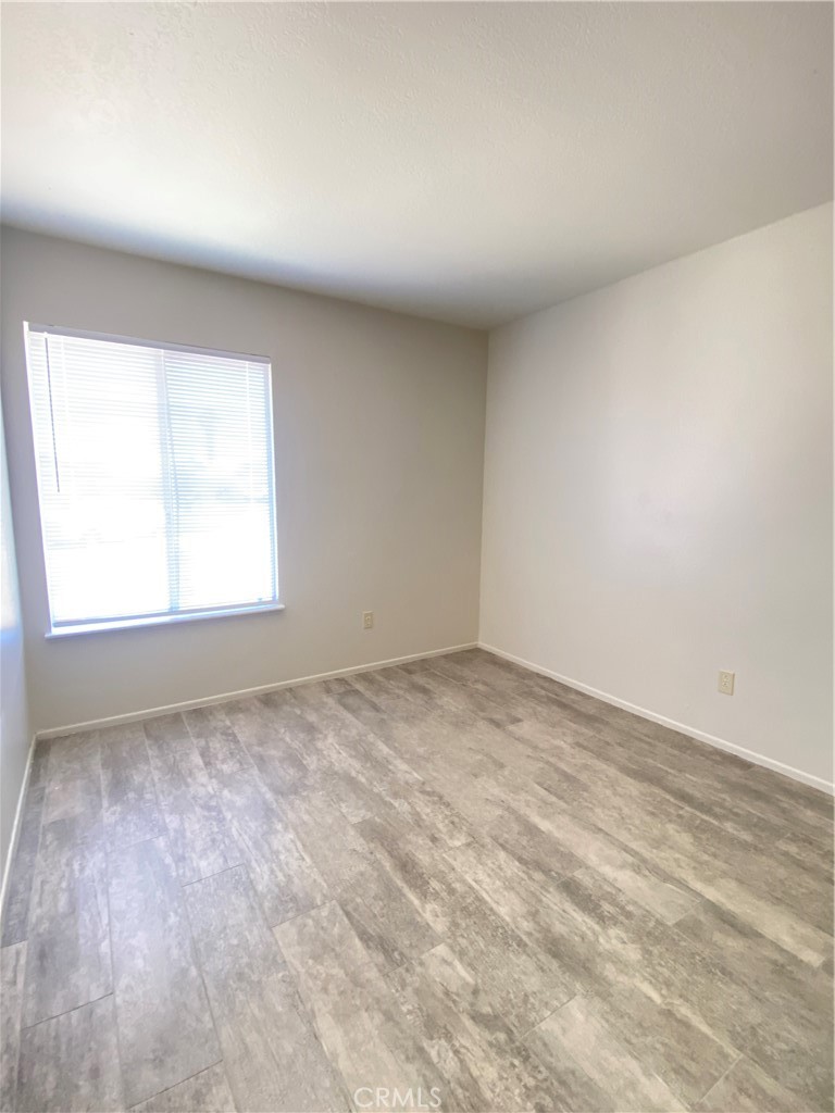 14663 Rio Grande Drive Moreno Valley, CA 92553 - Photo 11 of 15 an empty room with a window
