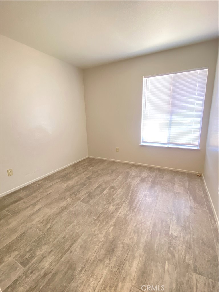 14663 Rio Grande Drive Moreno Valley, CA 92553 - Photo 10 of 15 an empty room with a window