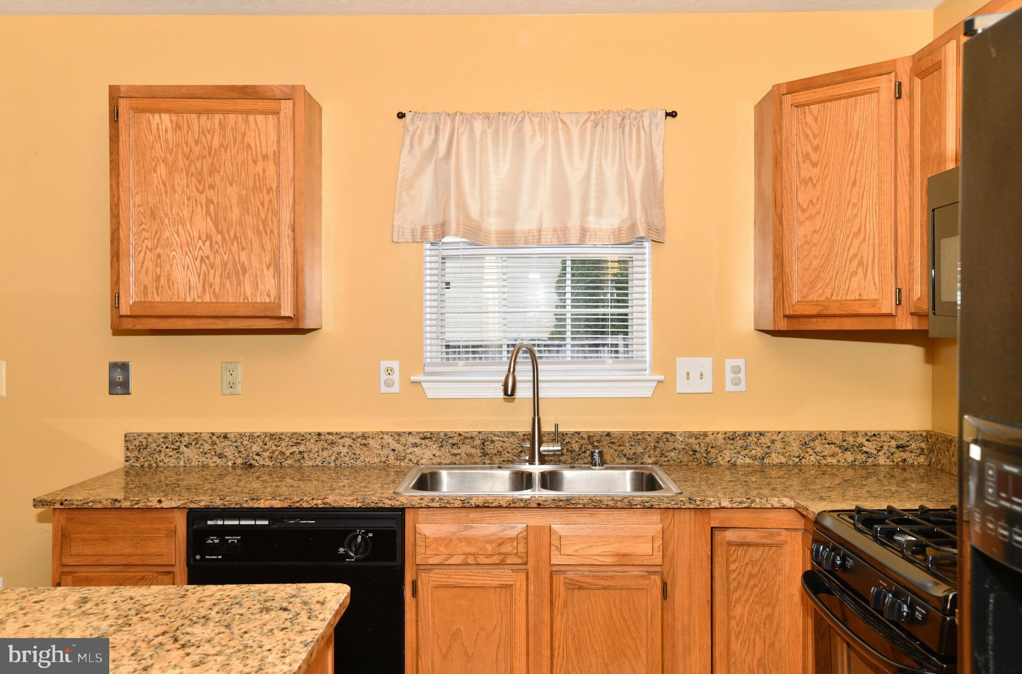 granite counter, new gooseneck faucet
