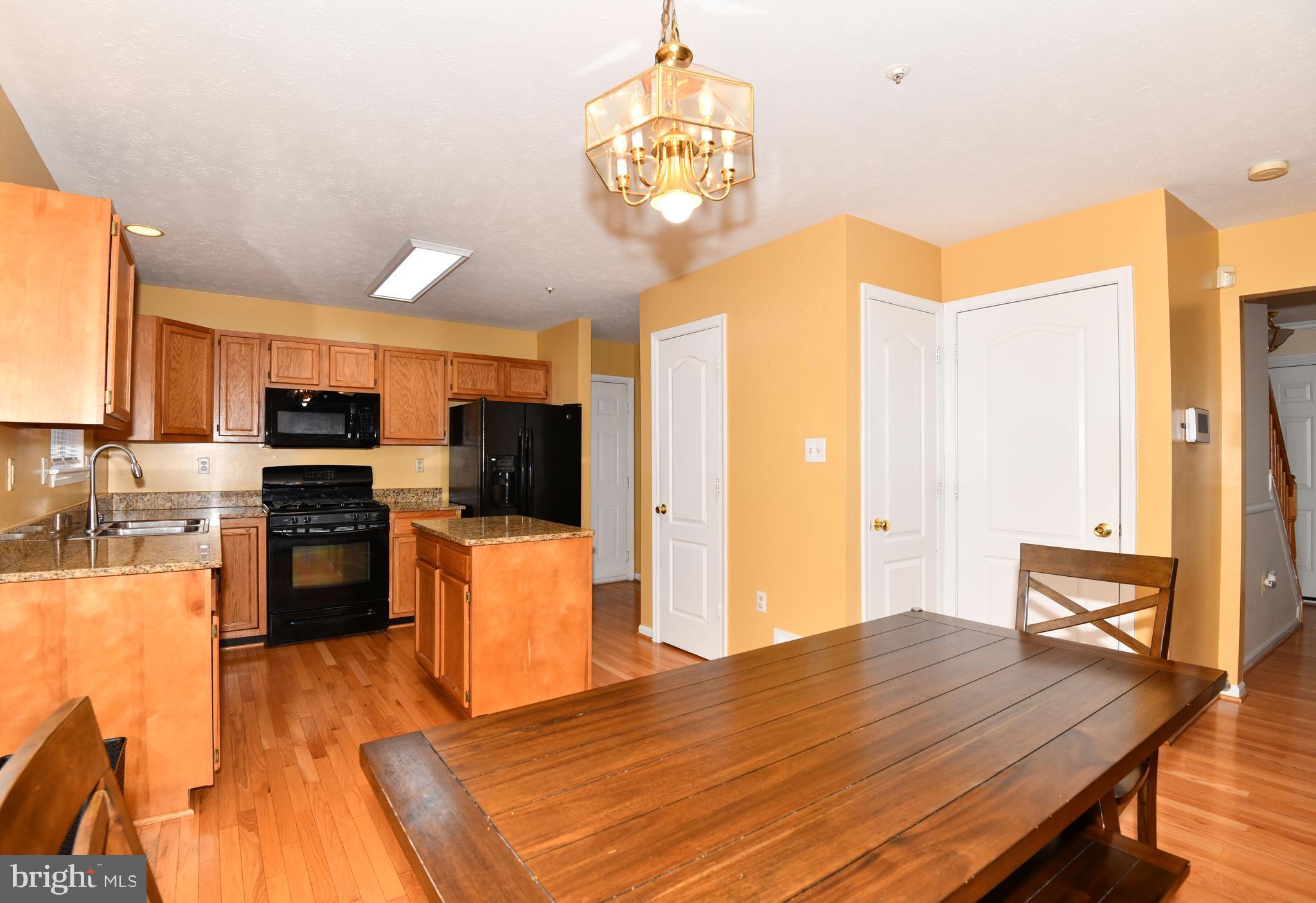7104 Friendship Road Clinton, MD 20735 - Photo 9 of 29 New ceiling light in kitchen