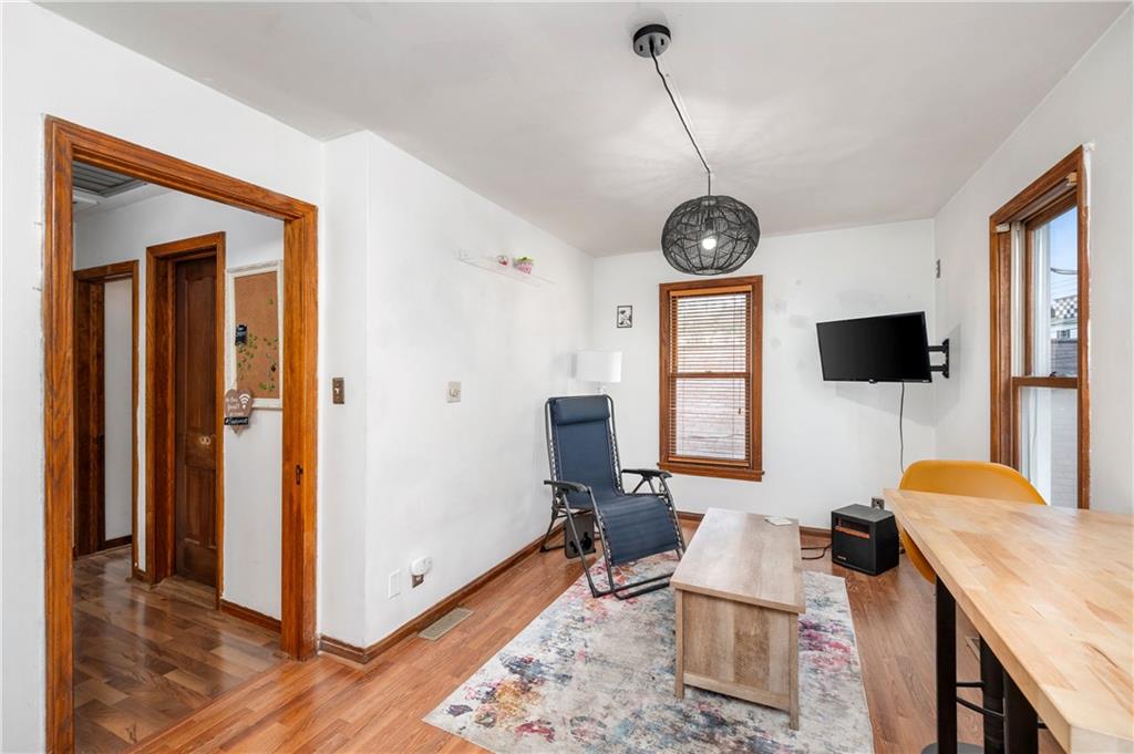 375 Main Street Volant, PA 16156 - Photo 17 of 34 a living room with furniture a flat screen tv and a window