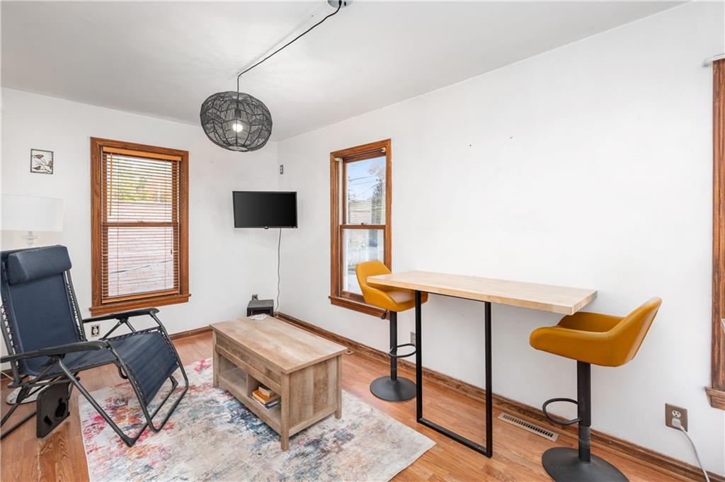 375 Main Street Volant, PA 16156 - Photo 18 of 34 a living room with furniture a flat screen tv and a window