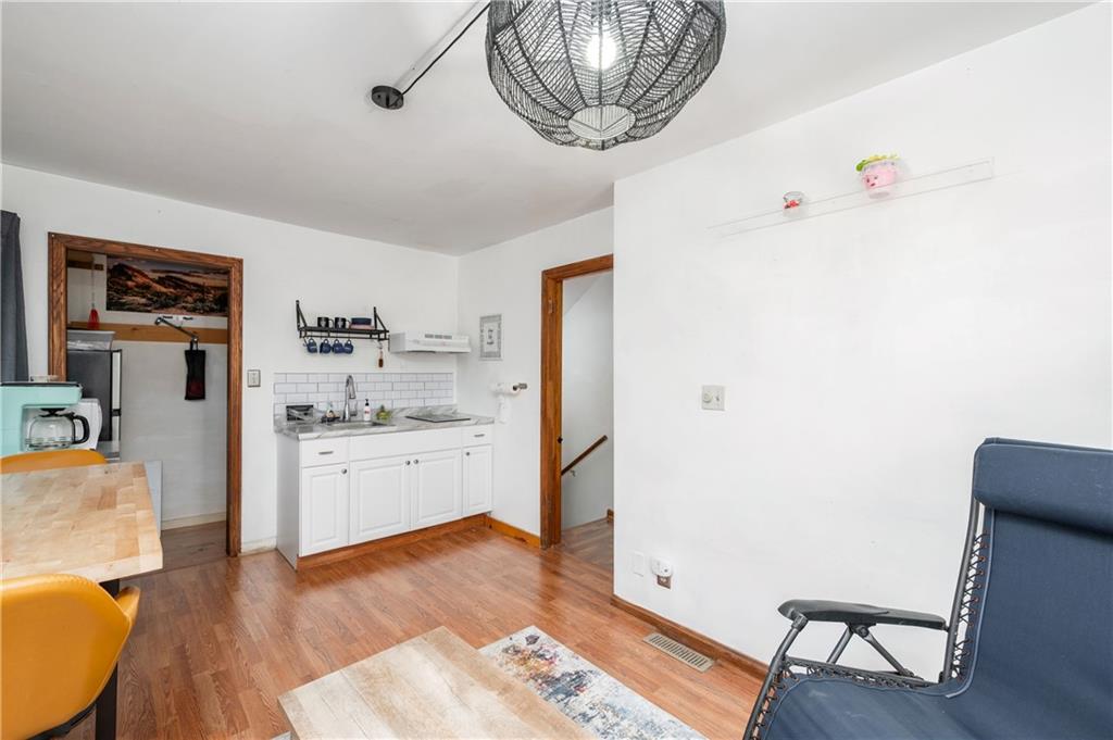 375 Main Street Volant, PA 16156 - Photo 20 of 34 a room with furniture and wooden floor
