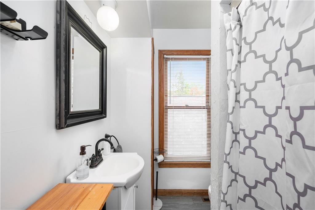 375 Main Street Volant, PA 16156 - Photo 23 of 34 a bathroom with a sink and a mirror