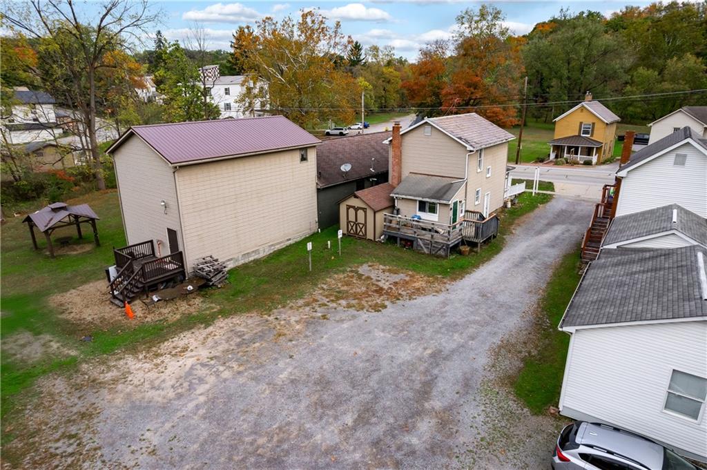 375 Main Street Volant, PA 16156 - Photo 26 of 34 a view of a house with a yard and sitting area