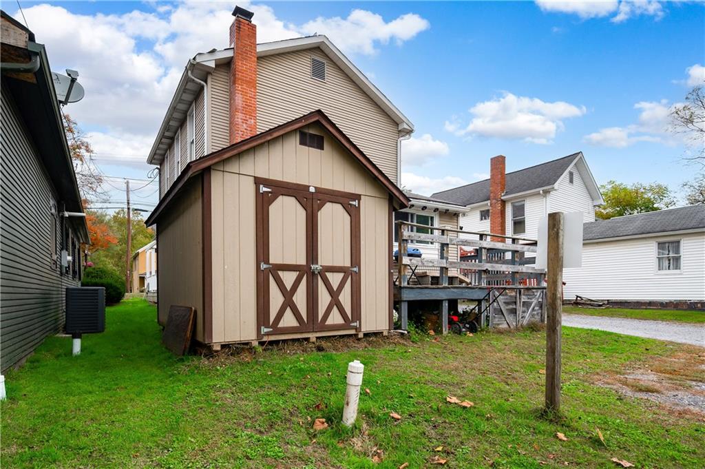 375 Main Street Volant, PA 16156 - Photo 28 of 34 a view of a house with a yard