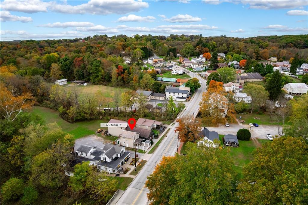 375 Main Street Volant, PA 16156 - Photo 32 of 34 an aerial view of a house with a garden