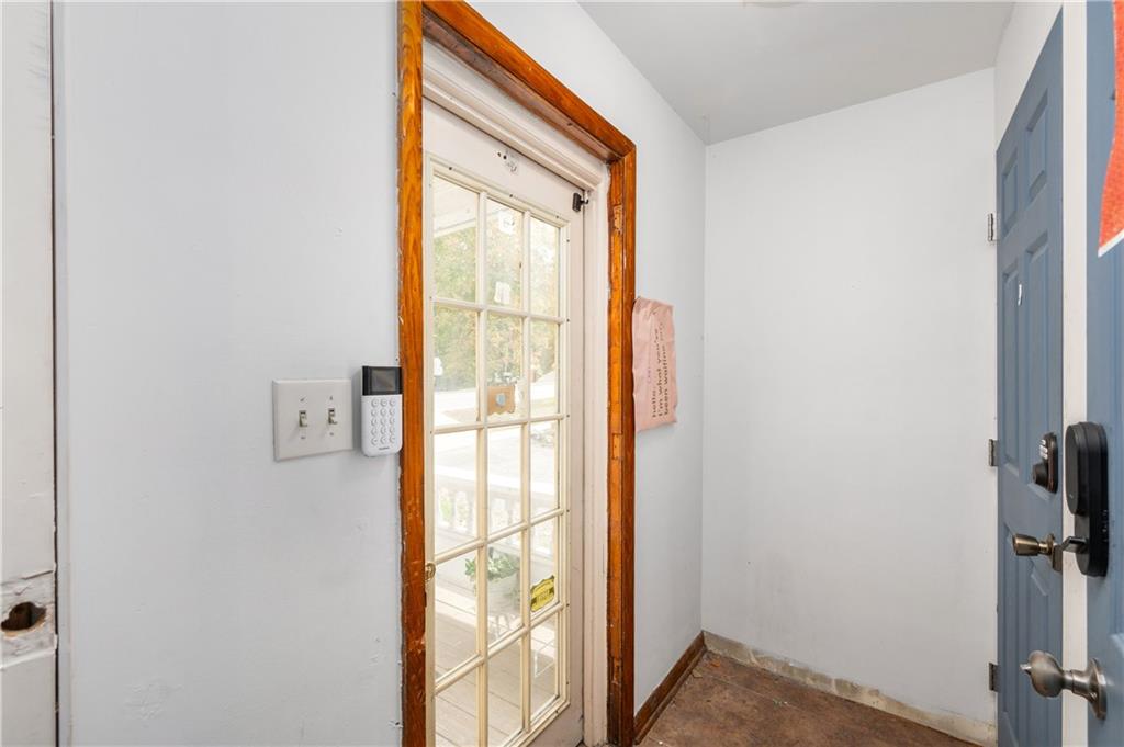 375 Main Street Volant, PA 16156 - Photo 7 of 34 a view of front door with wooden floor