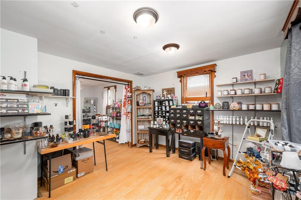 375 Main Street Volant, PA 16156 - Photo 8 of 34 a room with lots of wooden furniture and a potted plant
