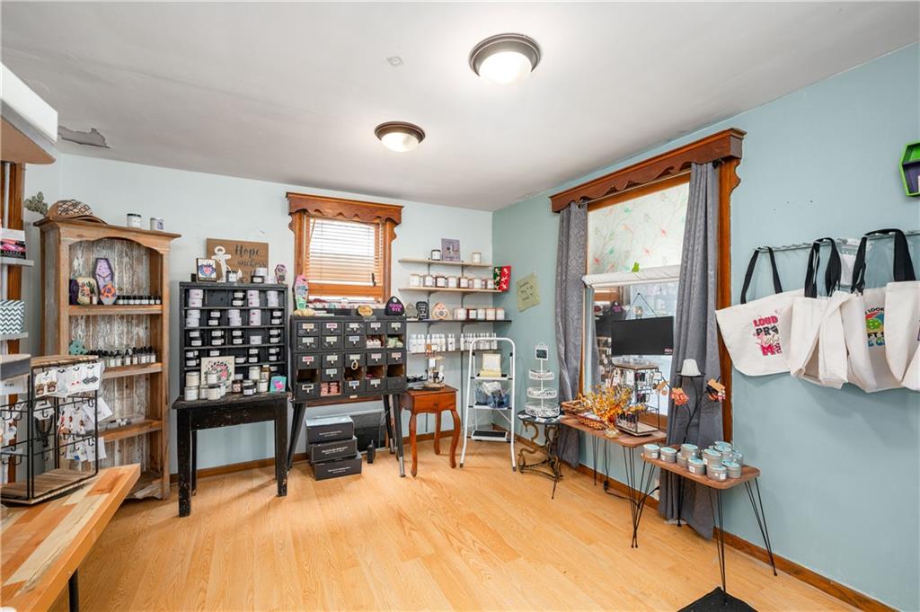 375 Main Street Volant, PA 16156 - Photo 9 of 34 a view of a livingroom with workspace and a window