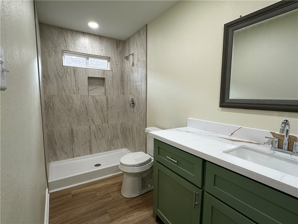 923 Craig Street, Unit B Corpus Christi, TX 78404 - Photo 9 of 9 a bathroom with a sink and a mirror