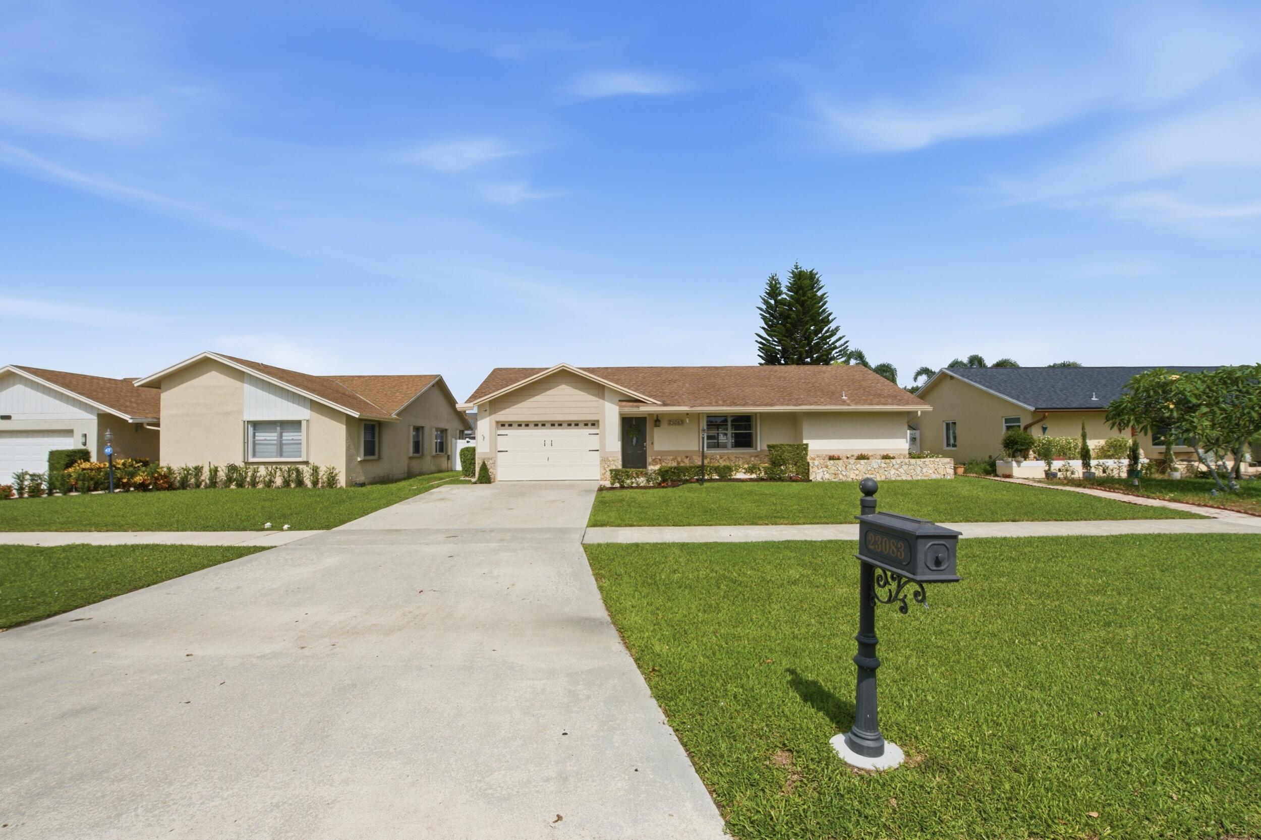 23083 Southwest 54th Avenue Boca Raton, FL 33433 - Photo 5 of 41 Front of the home